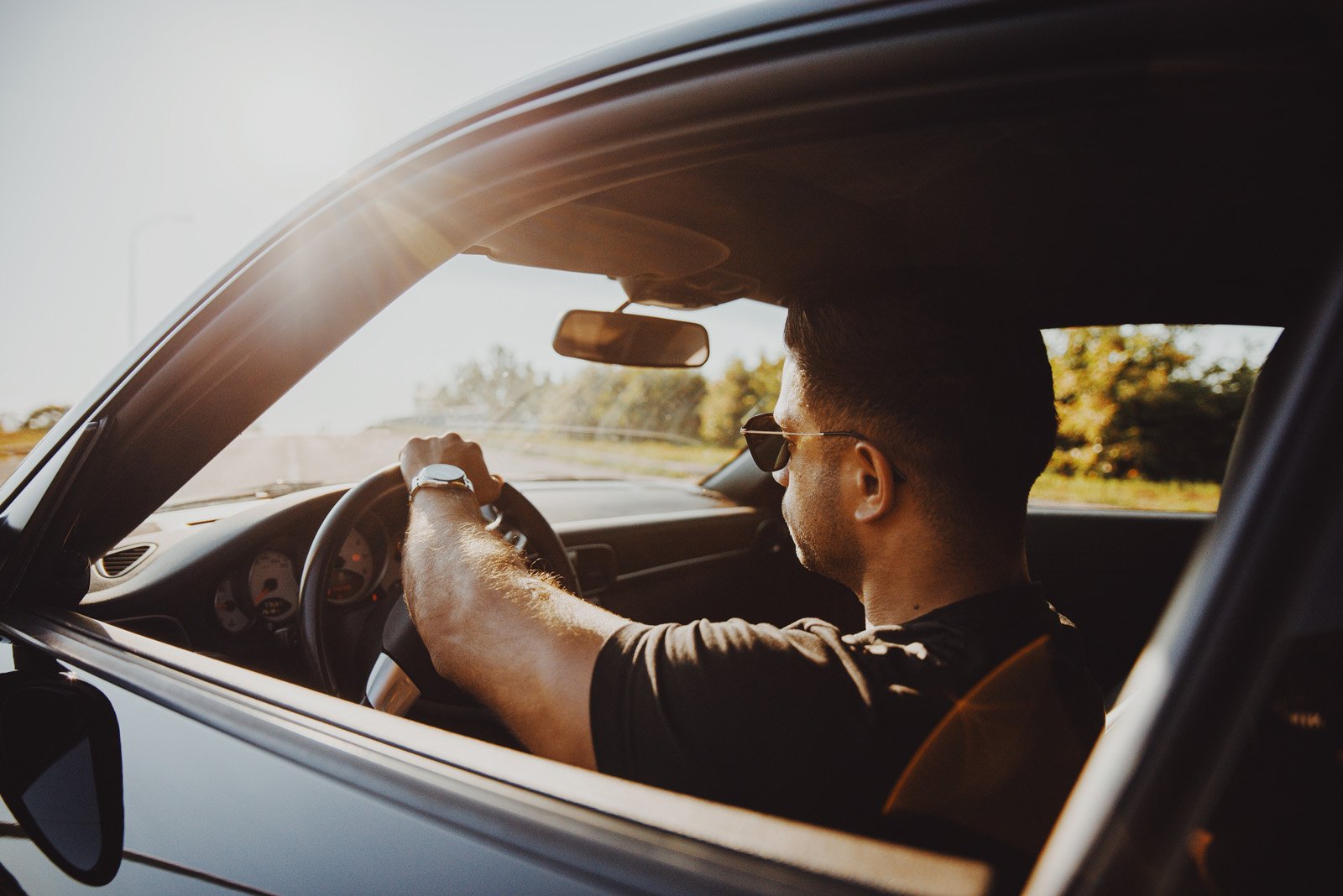 man driving a vehicle