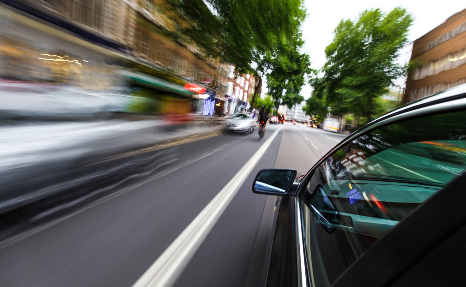 mirror-view-speeding-car mirror-view-speeding-car